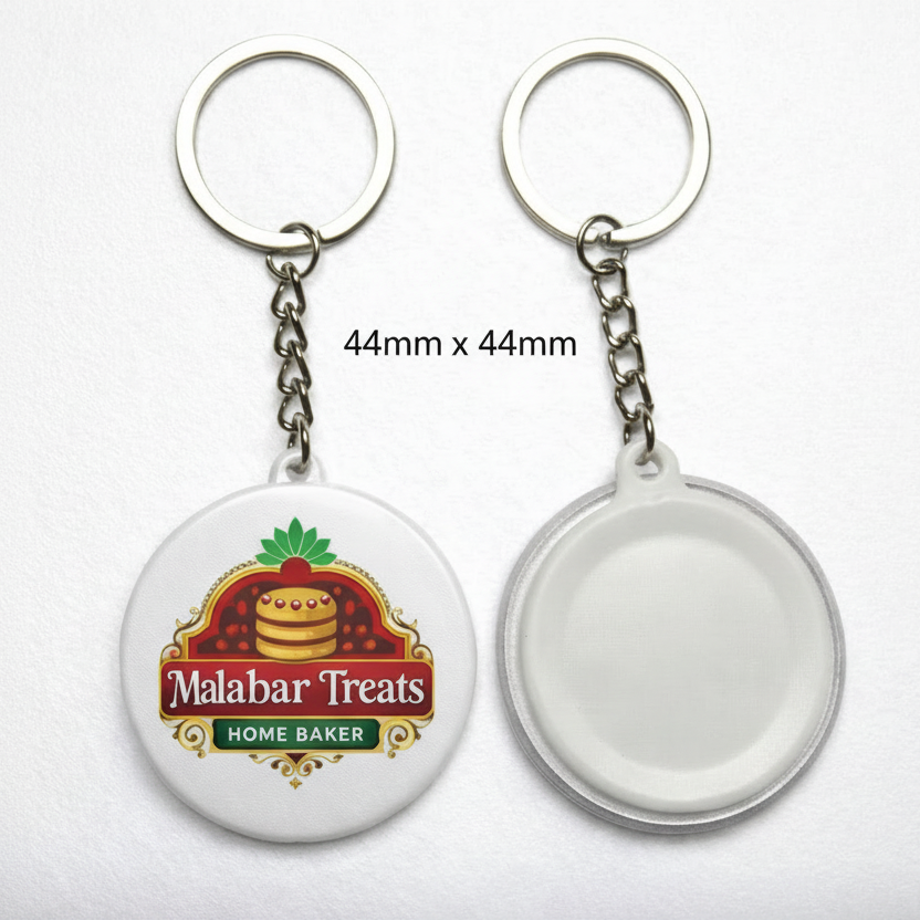 Two keychains with 'Malabar Treats Home Baker' branding on a white background