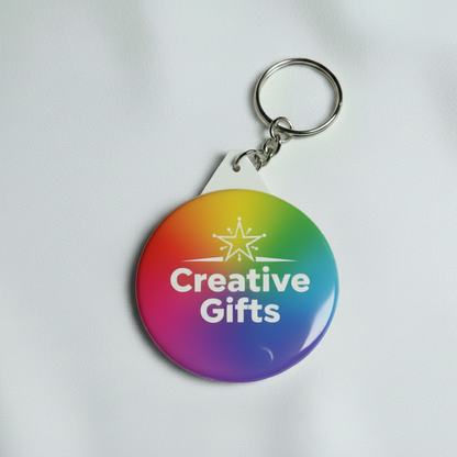 Keychain with rainbow gradient and 'Creative Gifts' text on a white background
